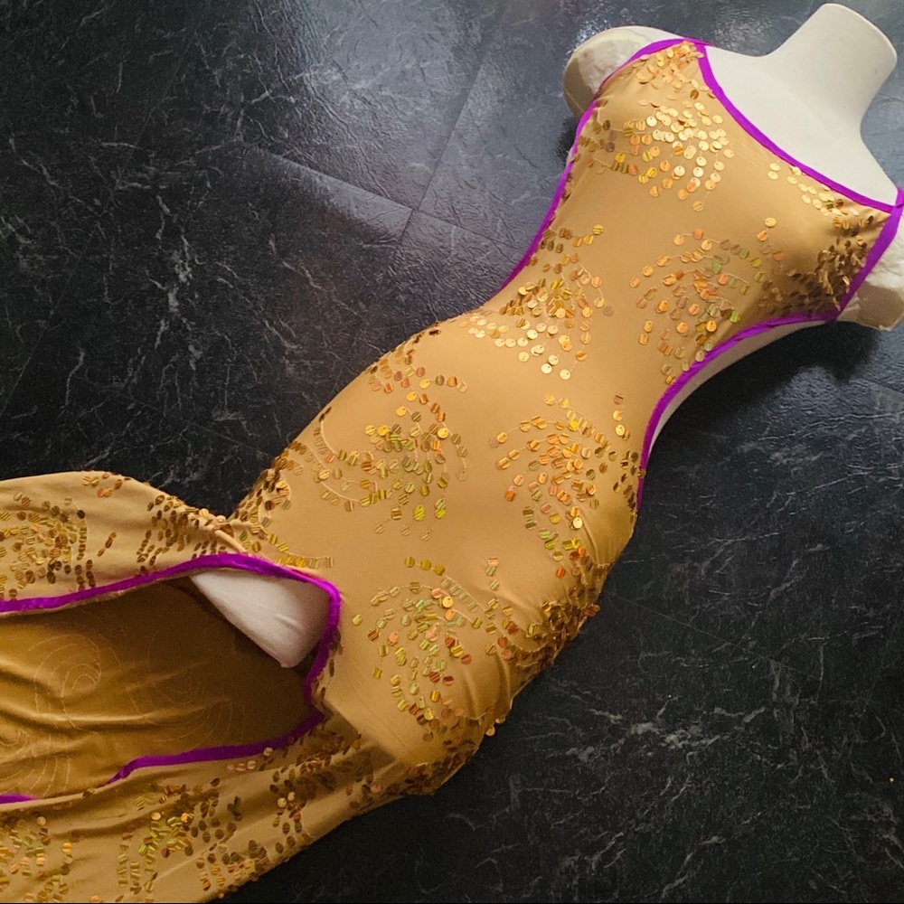 Gold and purple trimmed stripper costume with xtrs